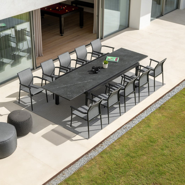 Livorno extendable garden table with all-ceramic table top 220-330x106 and Loya stacking chair in charcoal mat