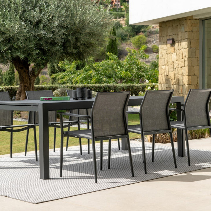 Livorno extendable garden table with all-ceramic table top 220-330x106 and Loya stacking chair in charcoal mat