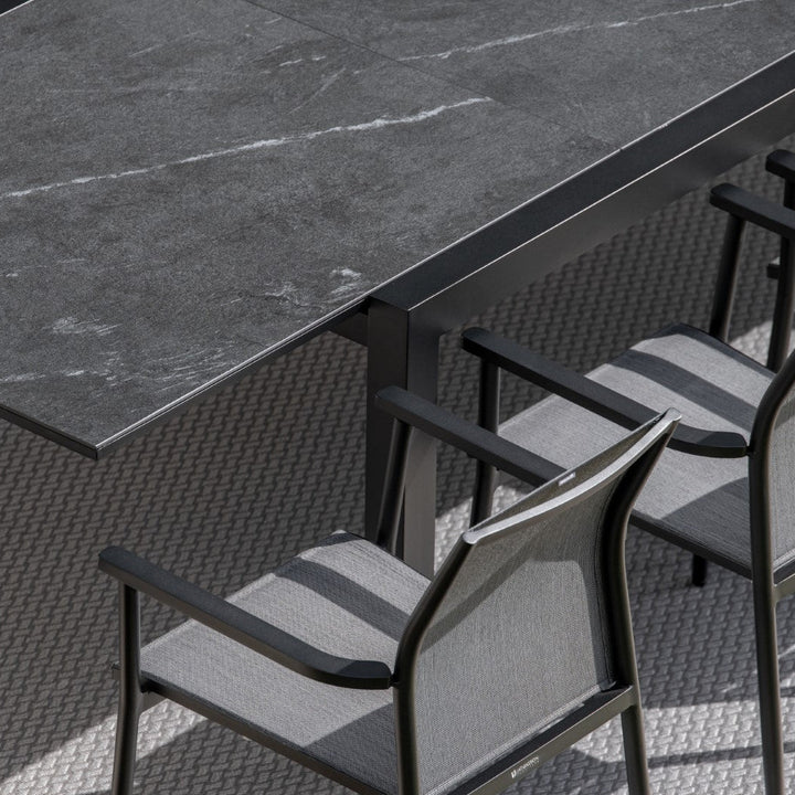 Livorno extendable garden table with all-ceramic table top 220-330x106 and Loya stacking chair in charcoal mat