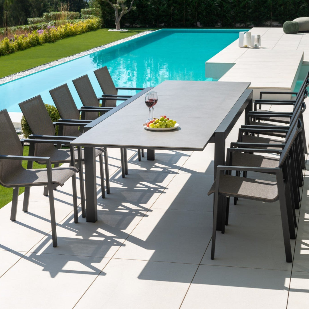 Livorno extendable garden table with all-ceramic table top 220-330x106 and Beja stacking chair in charcoal mat