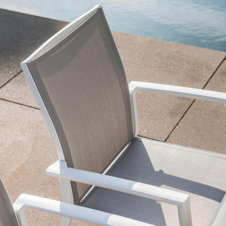 Sevilla stackable garden chair in white aluminum and light gray textilene