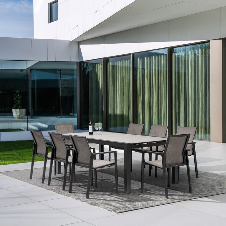 Livorno extendable garden table with all-ceramic table top 220-330x106 and Beja stacking chair in charcoal mat